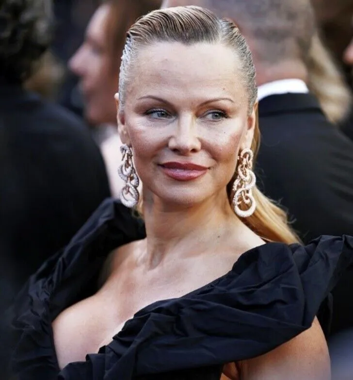 Pamela Anderson – Now.jpg?format=webp